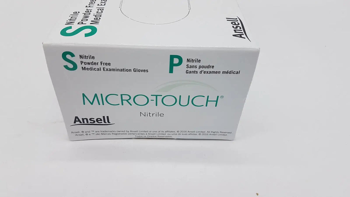 White box of ansell micro-touch pf nitrile medical examination gloves labeled with green s and p sizes