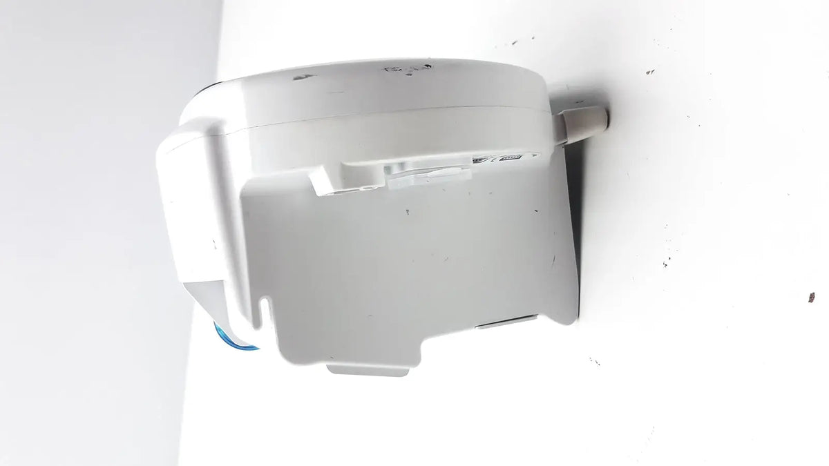 White plastic wall-mounted covidien kangro epump with rectangular base curved top and integrated card slots serial c13078066