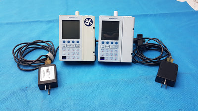 Lot of 2 Baxter Sigma Spectrum Infusion Pumps With AC Power Adapters P/N 35162
