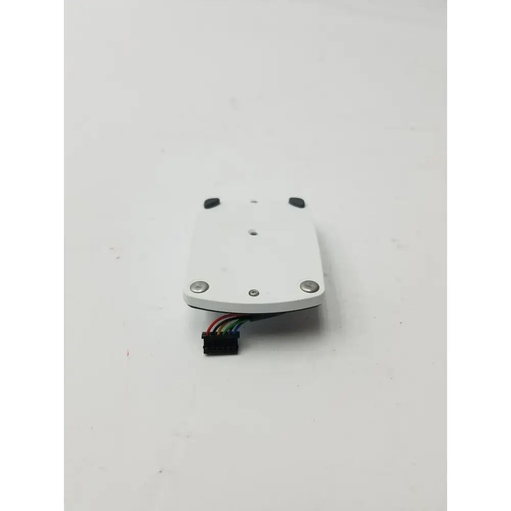 White rectangular lithium battery pack module with silver screws and multicolored ribbon cable for accu-chek inform ii