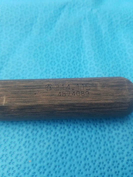 Dark brown wooden handle with engraved markings on hex screwdriver stainless surgical instrument stainless steel