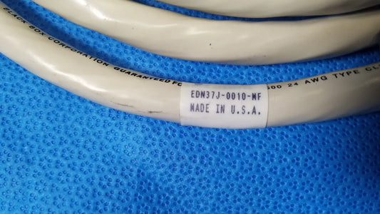 White coiled 37 male pin to 37 female pin connector data cable by black box corporation made in usa