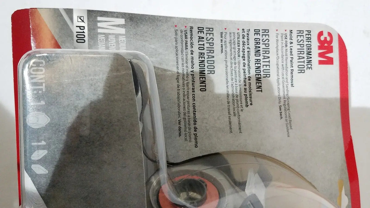 3m half face reusable respirator mask medium valved in clear plastic packaging with red and gray branding