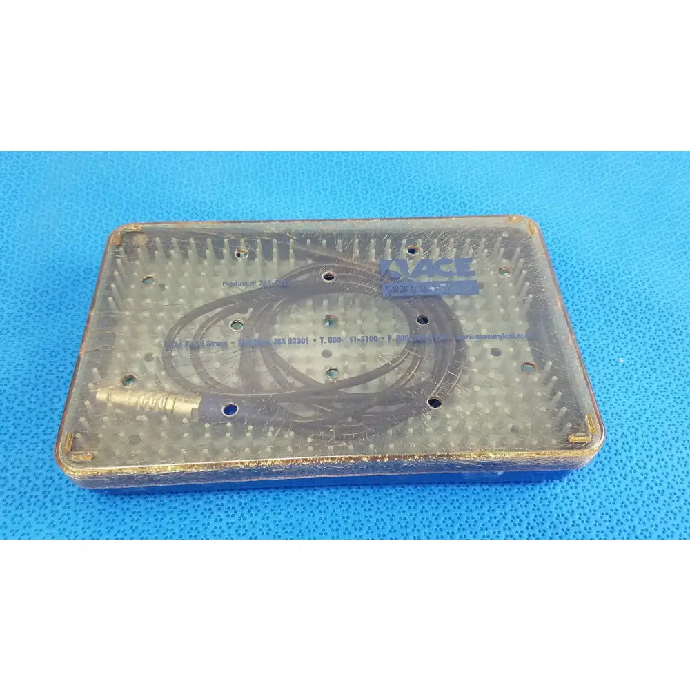 Clear plastic ace surgical sterilization tray with multiple holes for organizing multigen radiofrequency probe tools