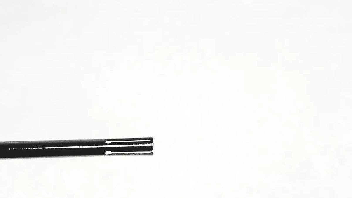 Black metal aesculap dissector surgical instrument with polished finish and three parallel slots for minimally invasive surgery