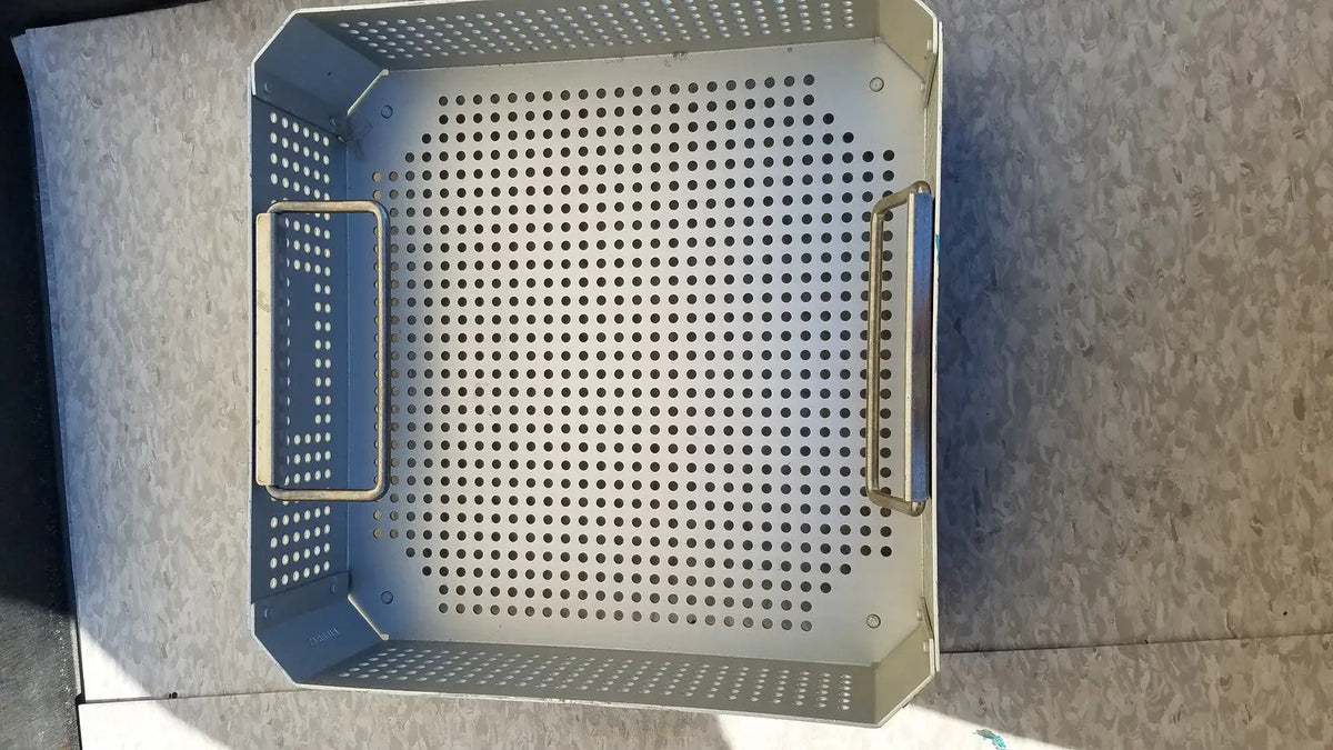 Silver perforated metal grill basket with two side handles for aesculap jk341 half size sterilization case and lid