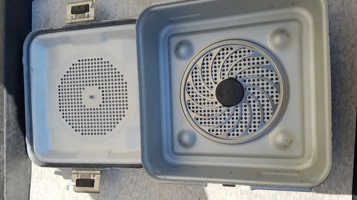 Gray plastic aesculap jn340 instrument sterilization container tray with perforated lid and circular ventilation design