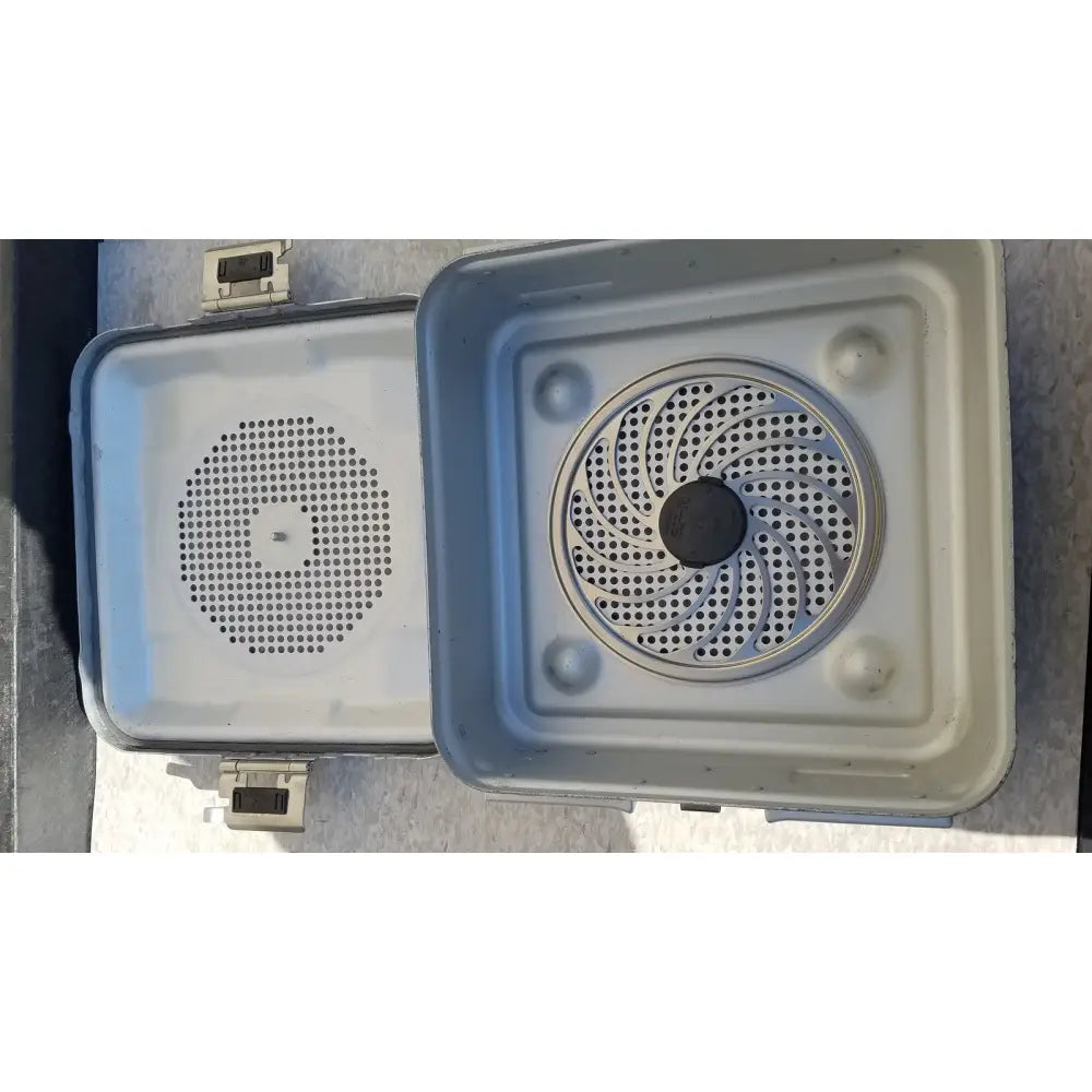 Gray plastic aesculap jn340 instrument sterilization container tray with perforated lid and circular ventilation design