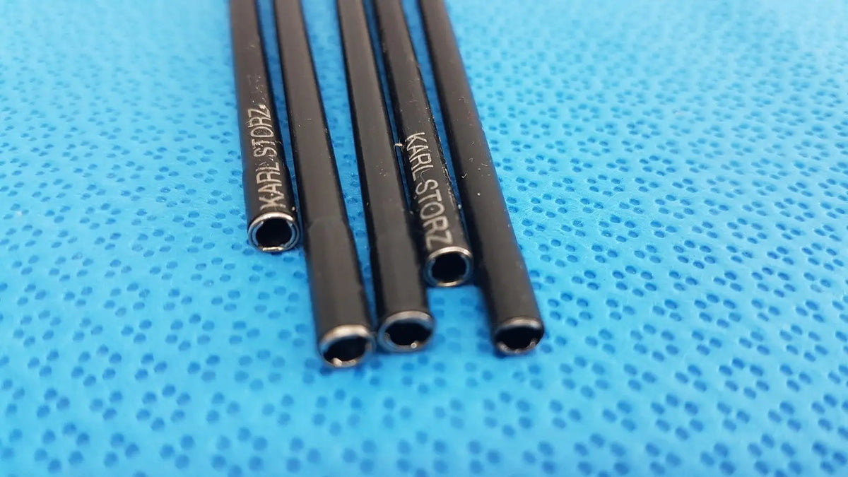 Black cylindrical aesculap laparoscopic grasper tubes engraved karl storz for medical use lot of 5 model 33300