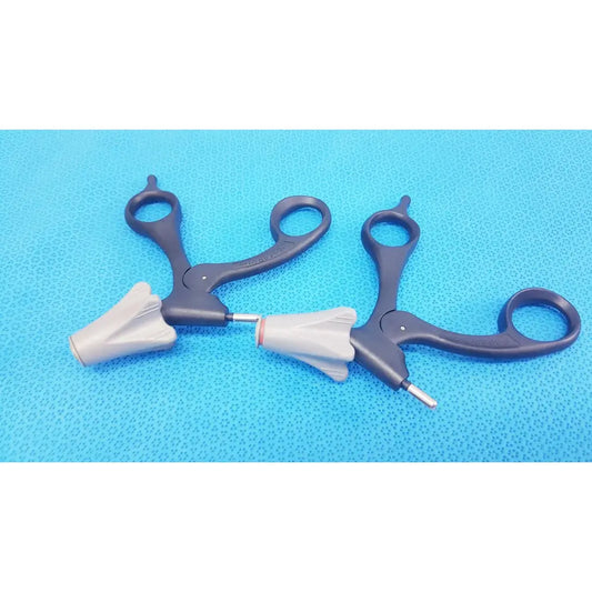Black and gray surgical forceps with ergonomic handles and textured grips from the Aesculap p0958r quick snap lot of 2
