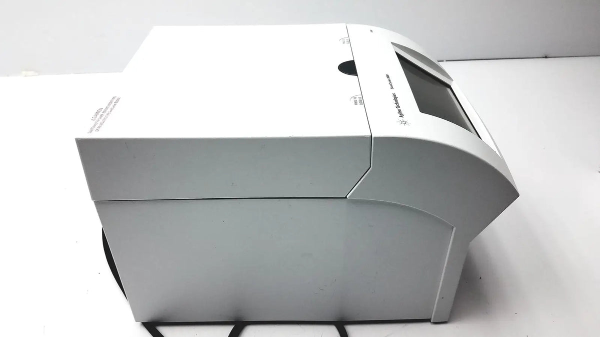 White sleek agilent surecycler 8800 touch screen thermal cycler with small screen and branded logo on front panel