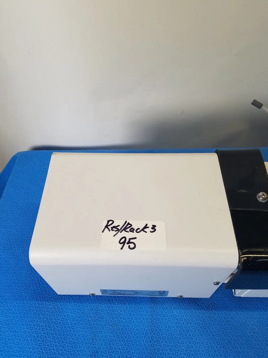 White rectangular agilent technologies 810 peristaltic pump with black side panel and handwritten reuse medical label rack 3 95
