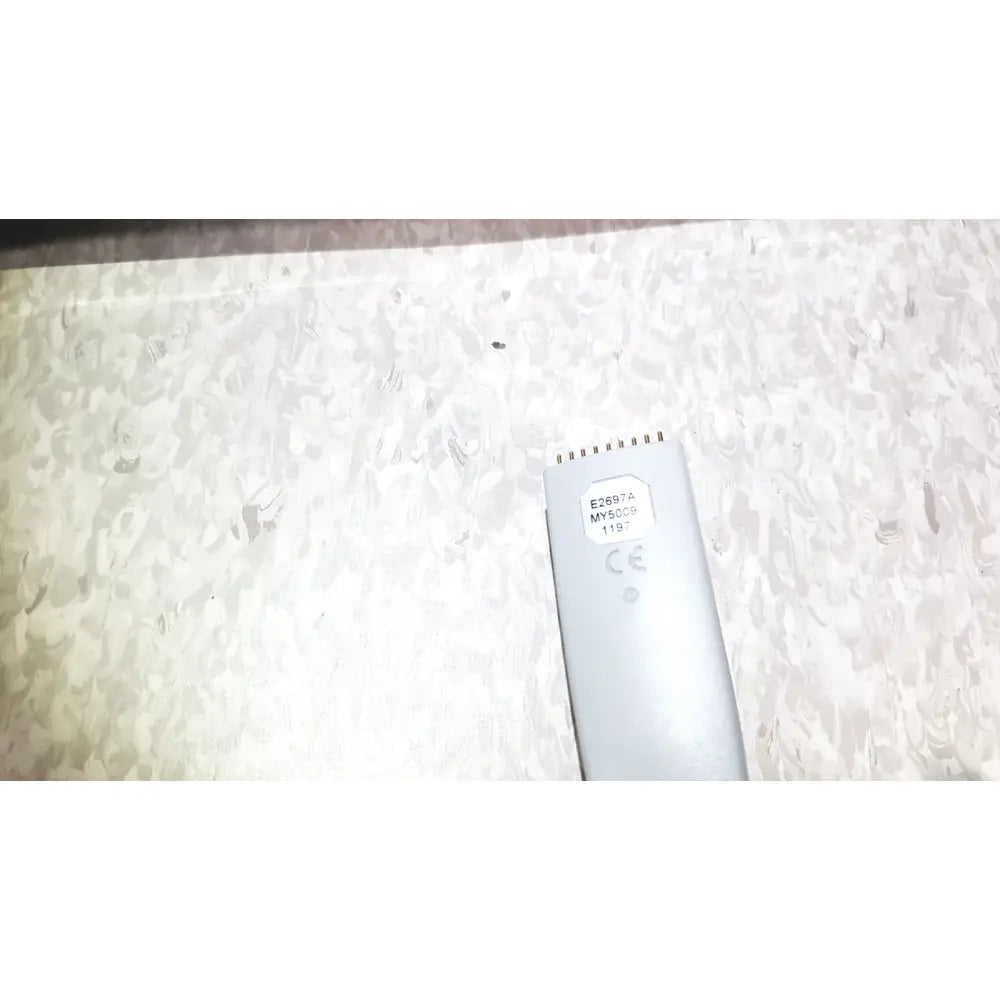 Silver electric hair clipper with matte finish and rectangular head featuring small blades for agilent technologies e2697a high impedance adapter