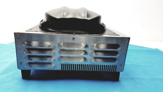Black rubberized top on silver metallic chassis with ventilation slots and screws of aladdin temp-rite heat demand advantage plate heater