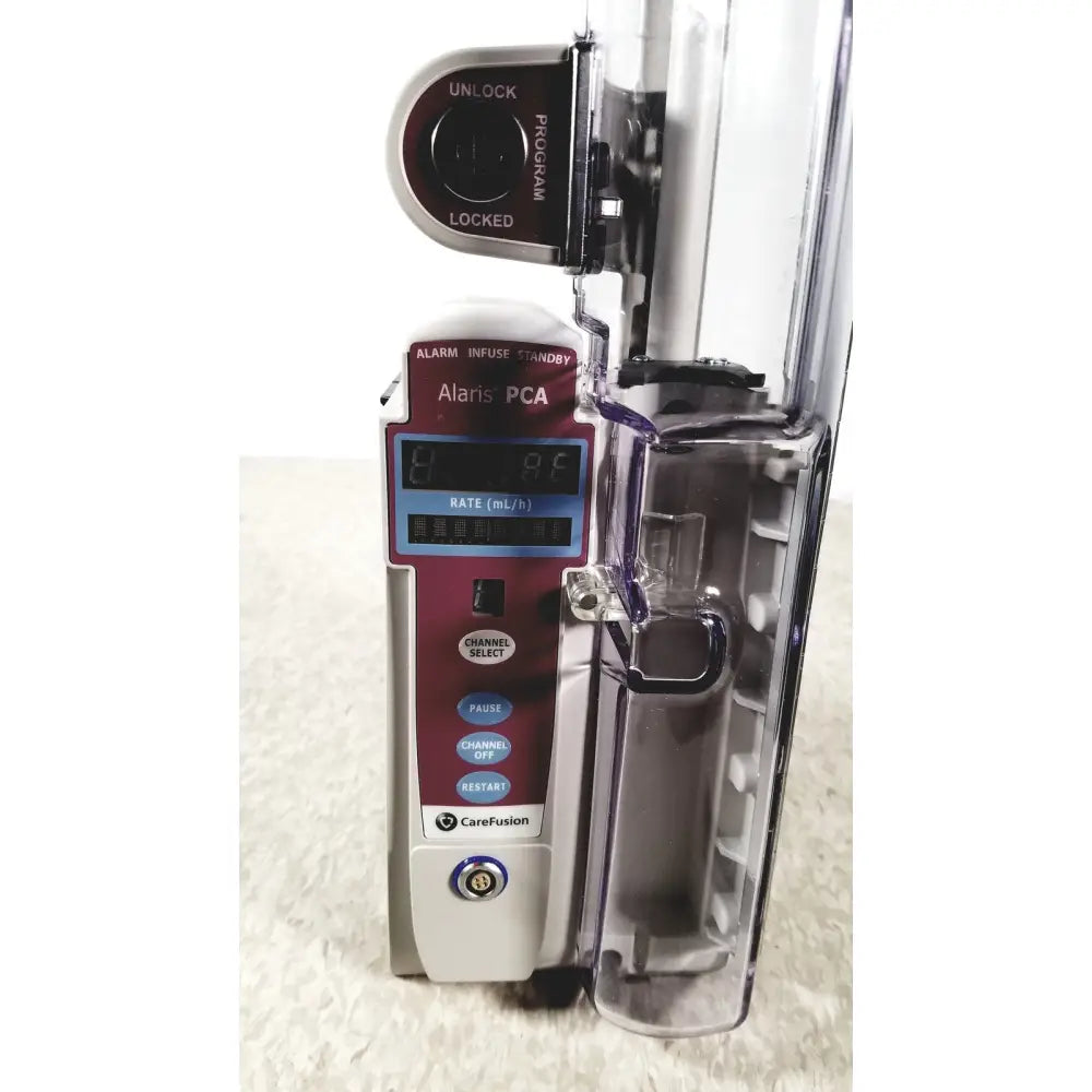Maroon and silver alariis pca model 8120 infusion pump with transparent medication bag attached without keys