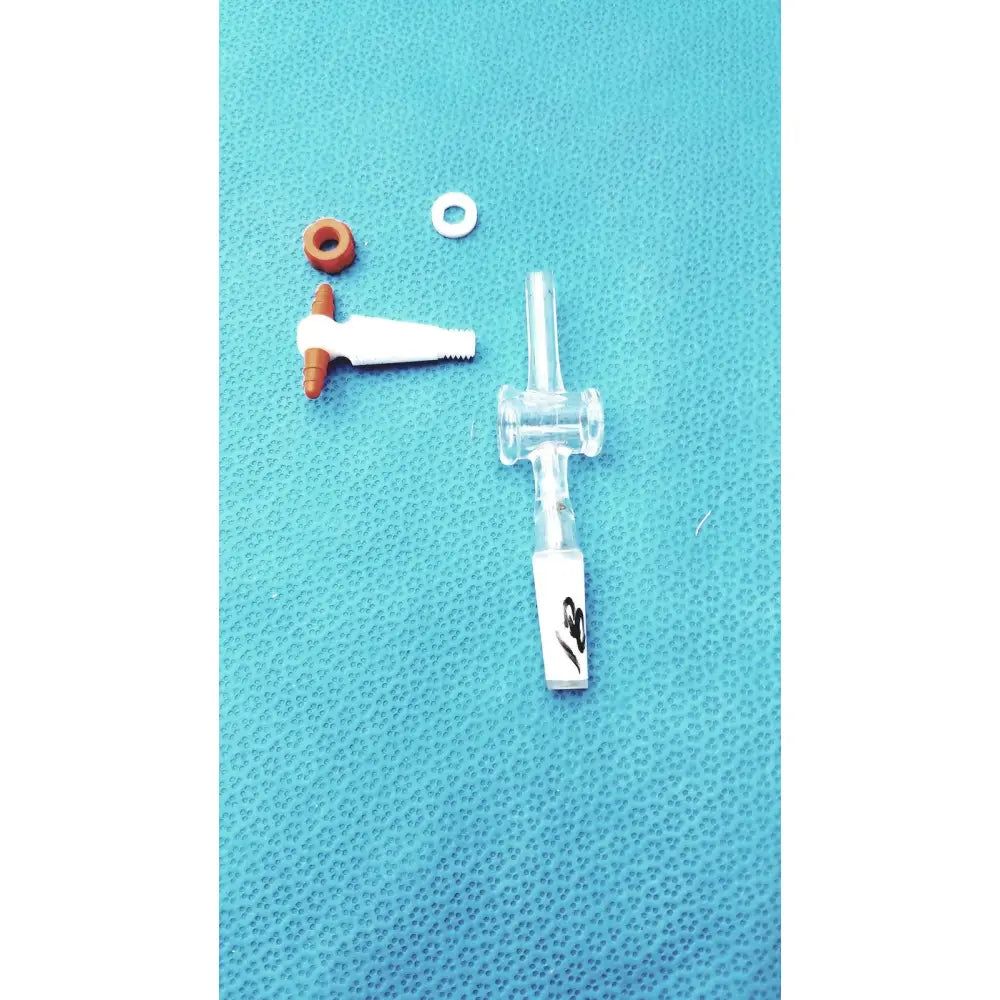Clear plastic Aldrich glass septum inlet flow control adapter with white and orange components 2 mm PTFE bore usa