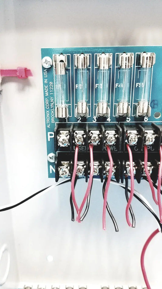 Blue altronix smp5ctx high current power supply charger 12vdc 24vdc showing front panel details