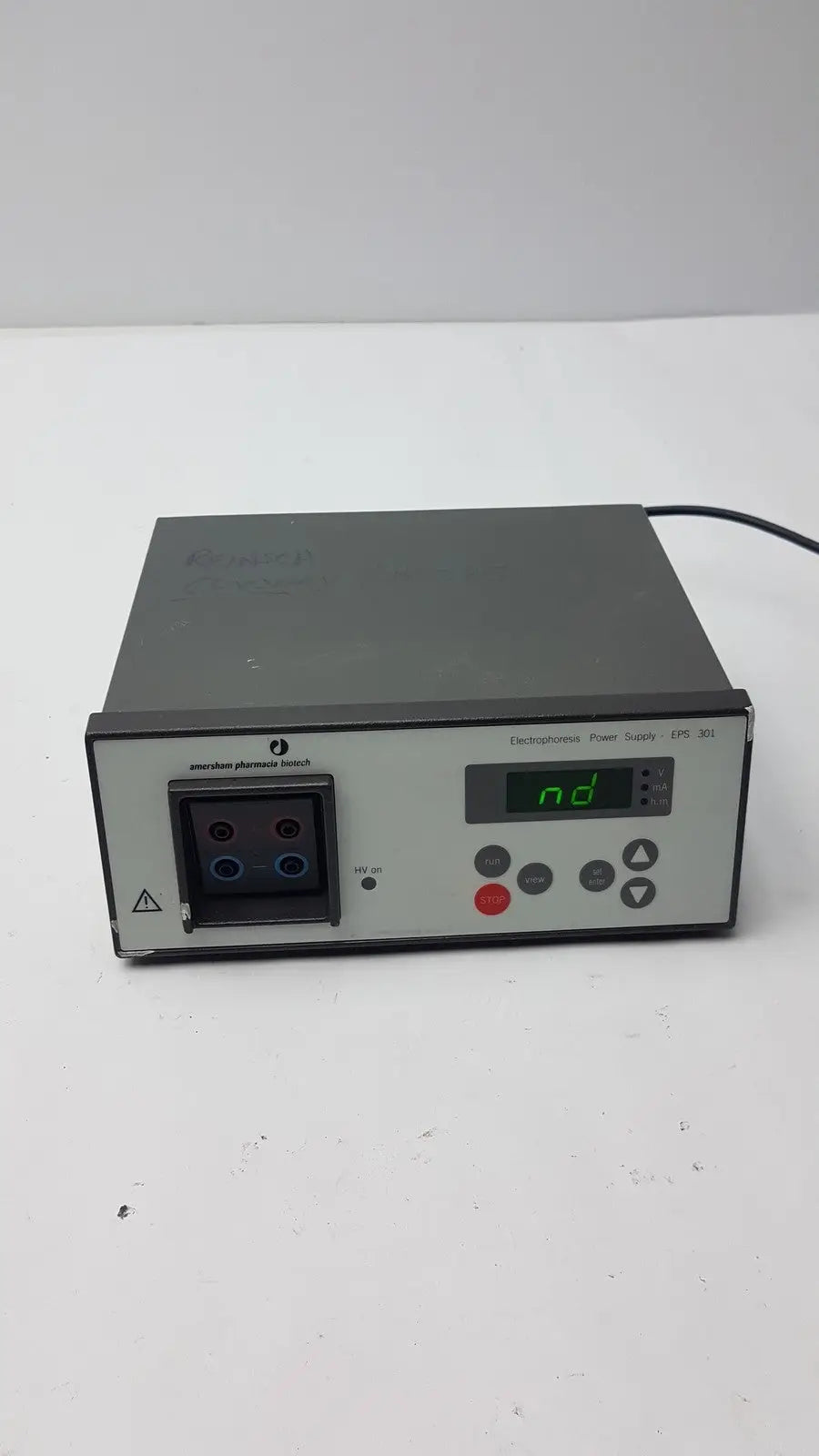 Black and silver amersham pharmaciia biotech power supply eps 301 with digital display showing nd for biotech power supply use