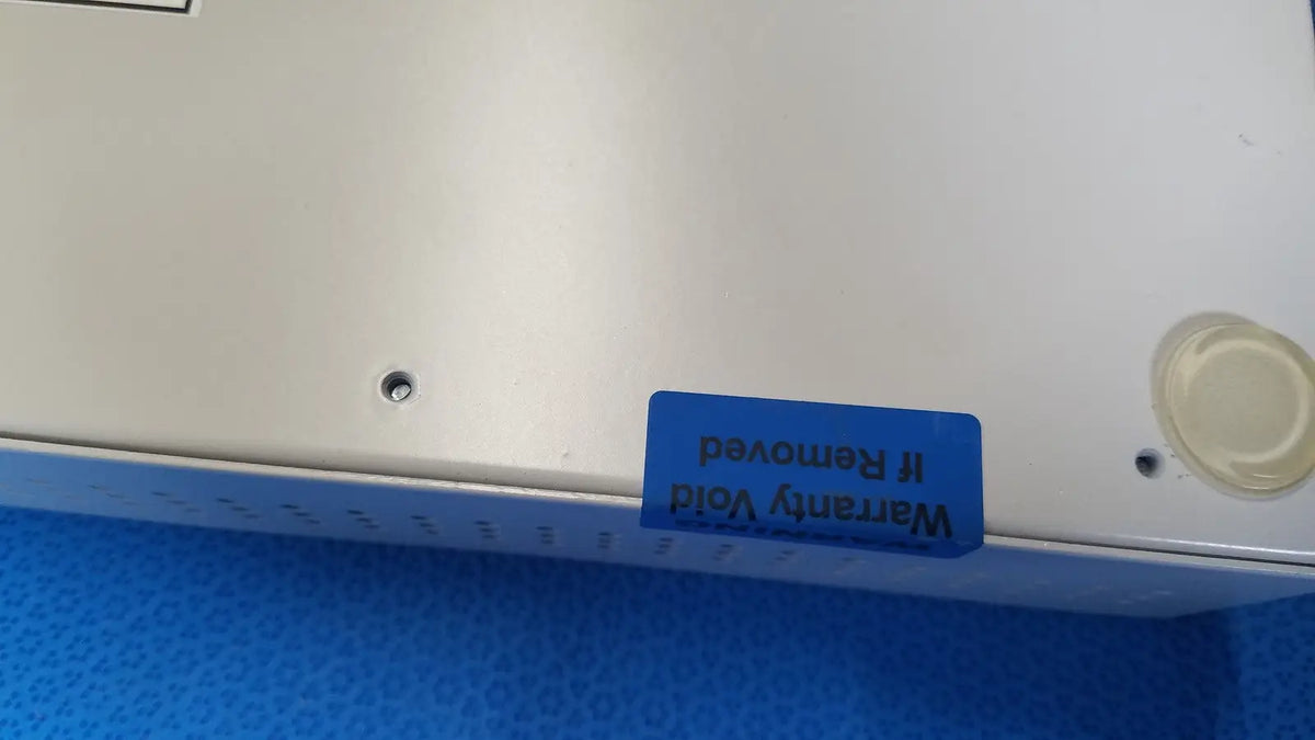 White plastic ampronix scanmaxx ds2165mp medical video converter with warranty void if removed sticker on back side