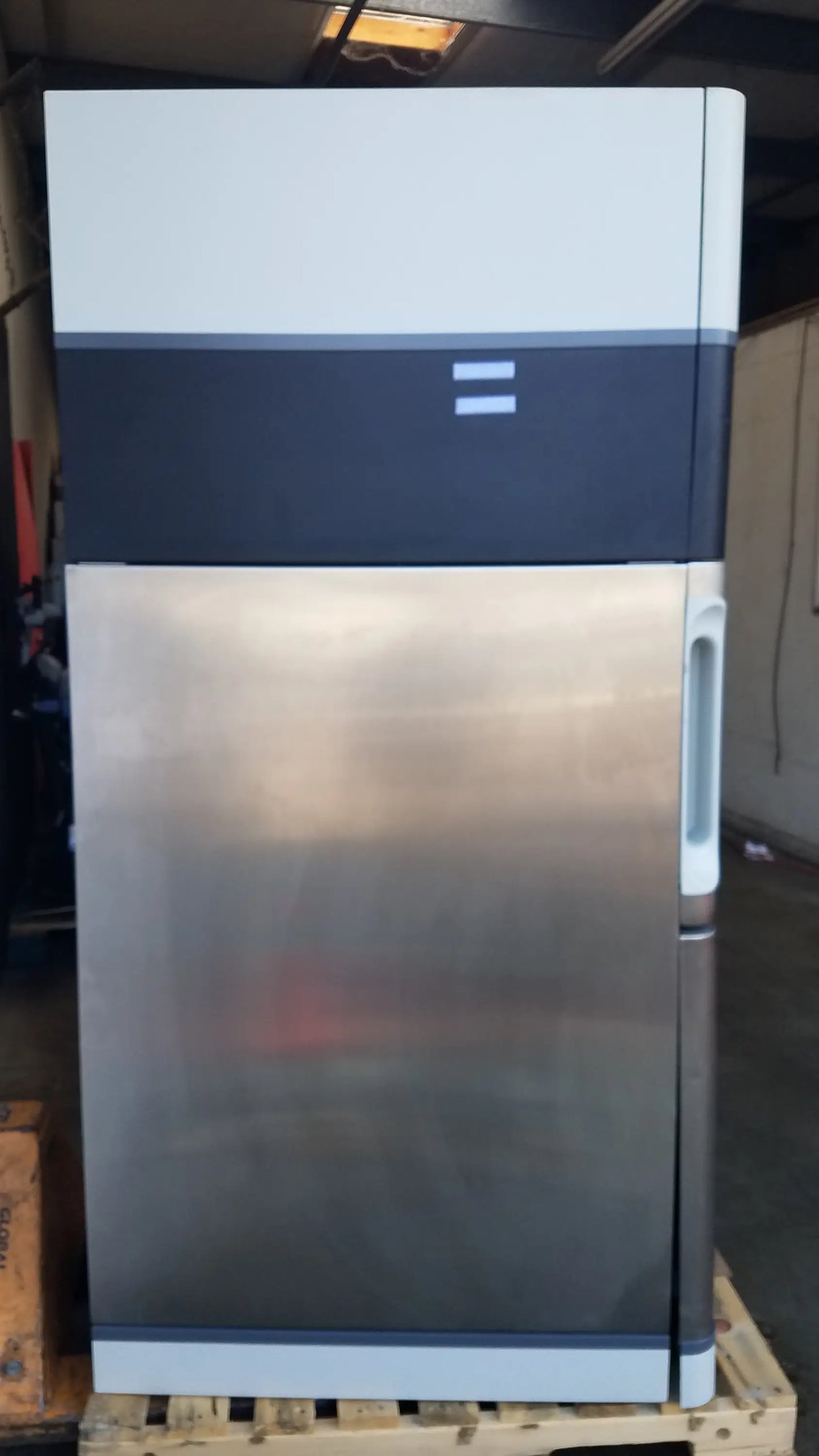 Amsco steris v-pro max low temperature sterilization system stainless steel refrigerator with white and dark gray upper section and led indicator lights