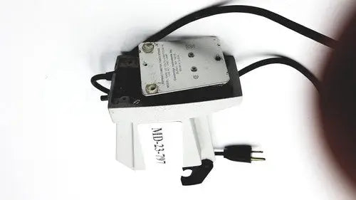 Black and white american optical reichert refractometer table stand with metal plate power cord and plug visible from back side