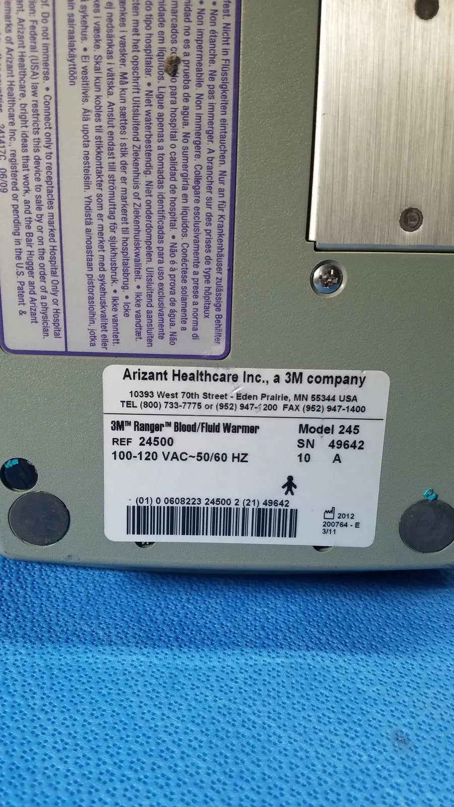 A beige 3m ranger blood and fluid warmer model 245 from arizant healthcare ranger fluid warming systems