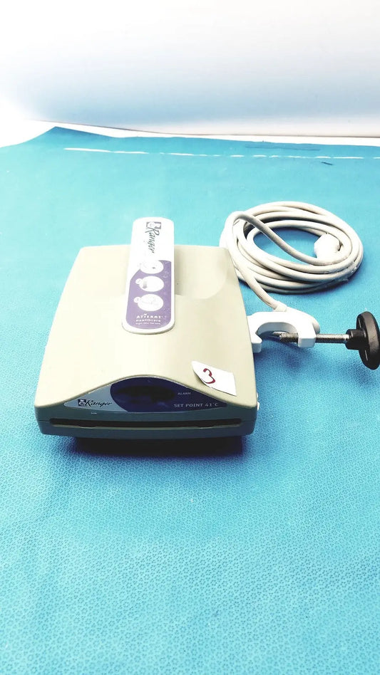 Beige and dark gray arizant healthcare ranger blood fluid warmer unit with kargen spy point 3.0 endoscope and coiled cable