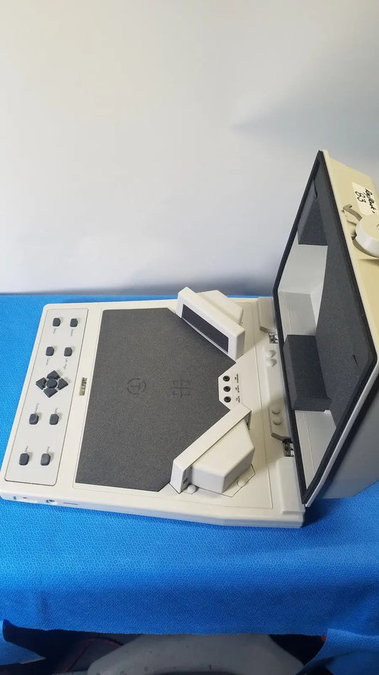 White Sony Walkman portable DVD player with flip-up screen and control panel used with Audioscan Verifit VF-1 hearing analyzer