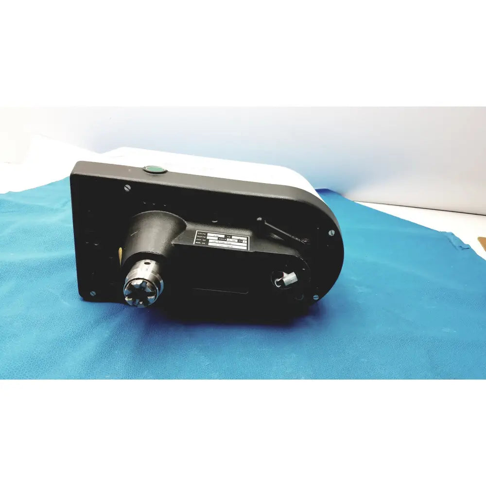Black and white variable speed grinder-polisher 120v with metallic chuck, labeled plate, and handle for precise polishing