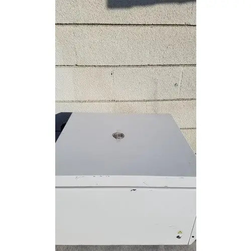 White rectangular beckman coulter spinchron dlx benchtop centrifuge outdoor unit with circular top vent