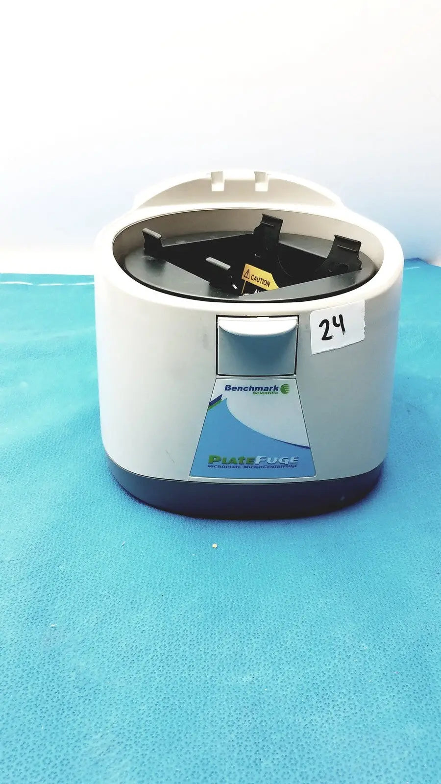 White and gray benchmark platefuge c2000 microplate microcentrifuge with black rotor compartment for laboratory use