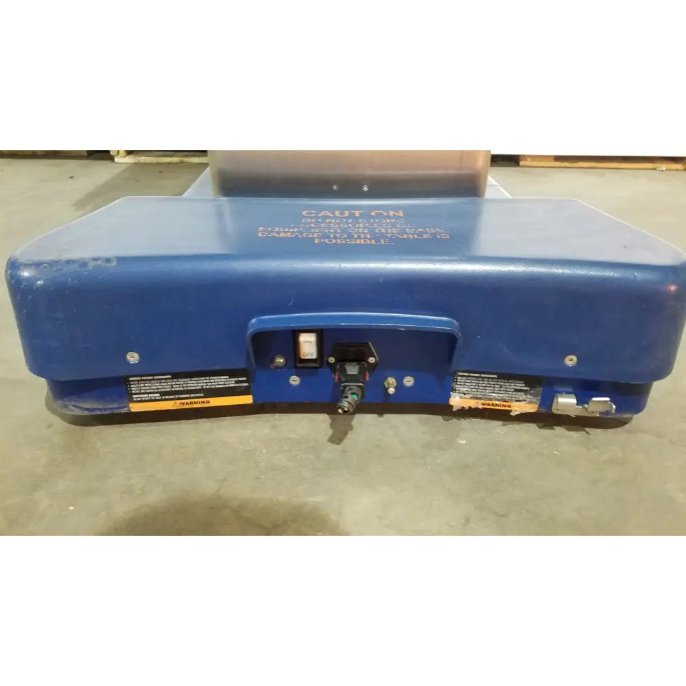 Blue industrial-grade electric pallet jack with sturdy plastic housing and control panel for berchtold d850 operon surgical table