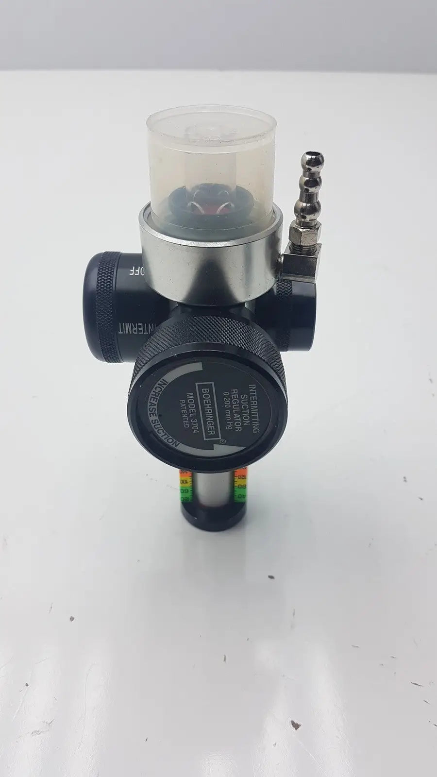 Boehringer 3704 platinum series intermitting suction regulator in black and silver with transparent pressure gauge housing