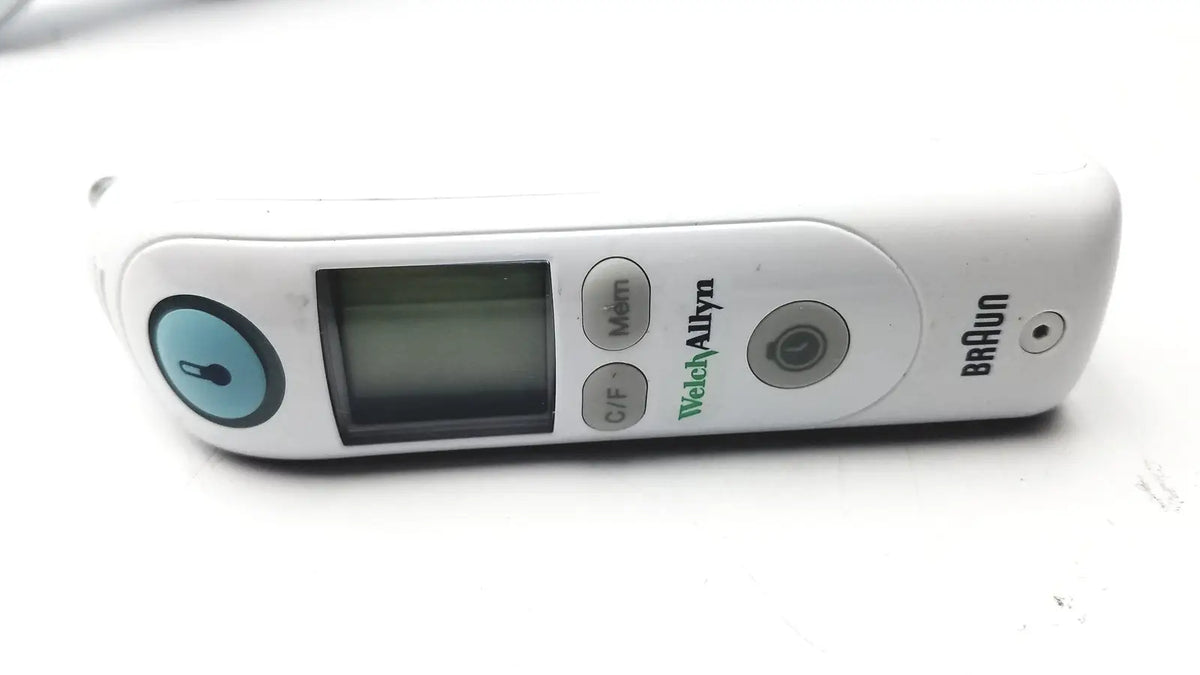 White braun thermoscan pro 6000 ear thermometer ref with non-contact infrared sensor and blue circular button