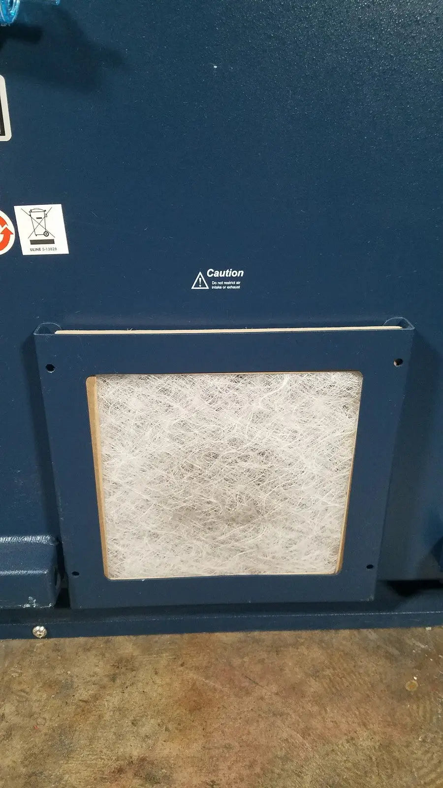Blue framed rectangular air filter with white fibrous material for bruker microflex mass spectrometer reuse medical device