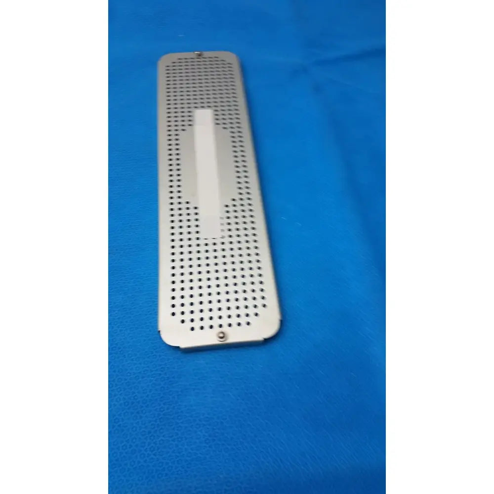 Silver metallic rectangular case medical ENCM sterilization container box lid with circular ventilation holes and screws