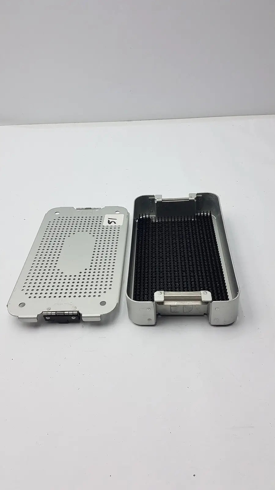 Silver metallic case medical mc02 solid brass sterilization container with perforated lid and black interior tray