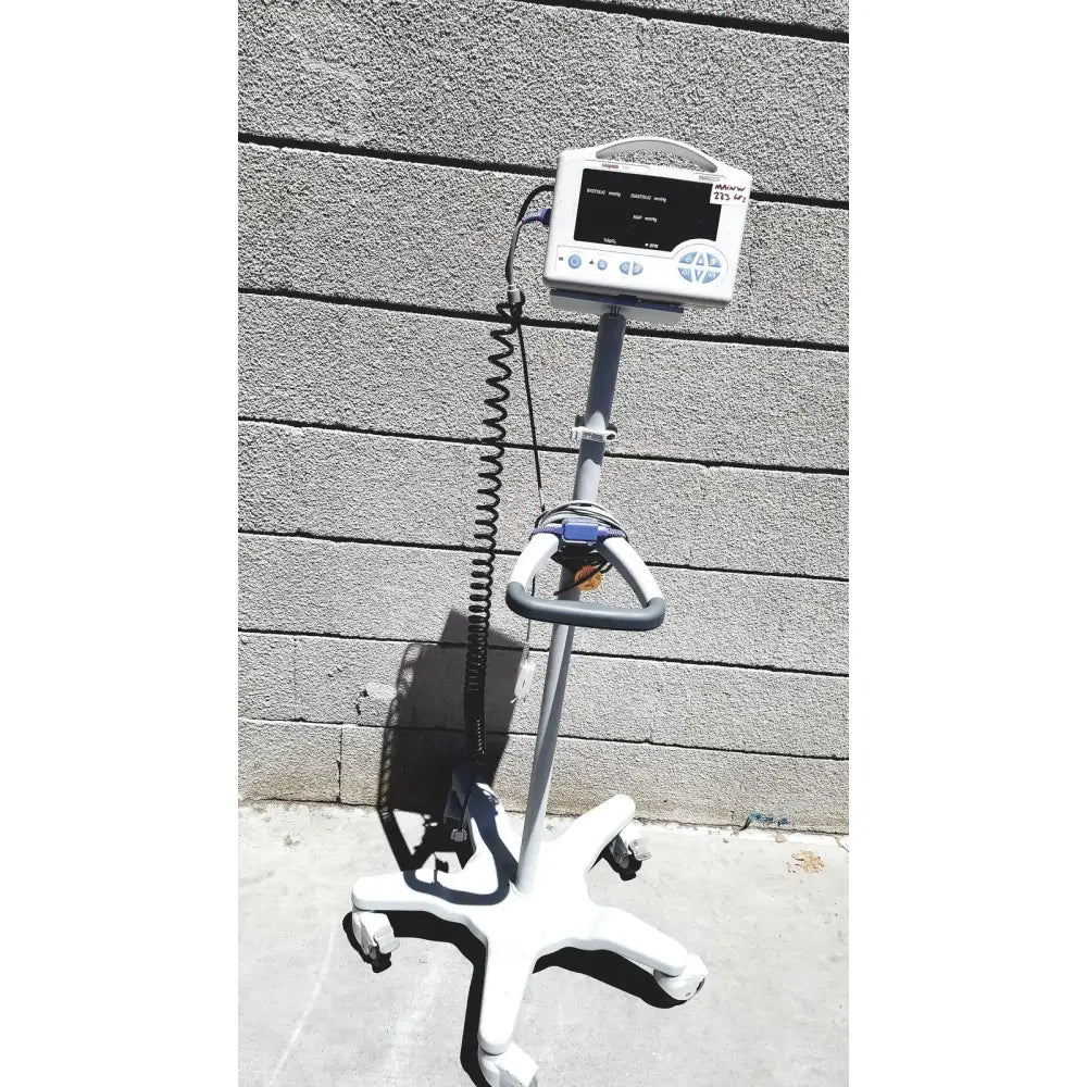 White and gray CASMED 740 vital signs monitor with sp02 finger probe on a rolling stand with coiled cable lot of 3