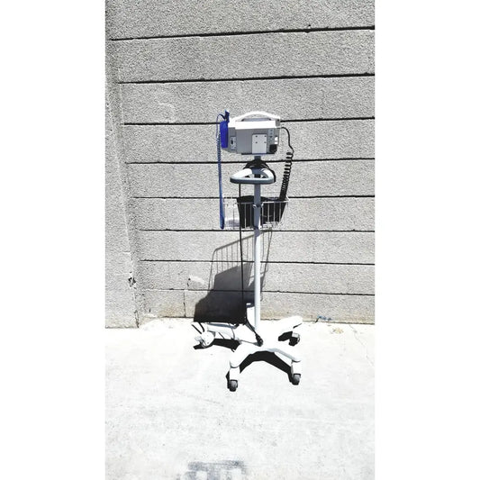 White medical iv infusion pump on wheeled metal basket cart in casmed 740 vital signs monitor rolling stand lot of 3