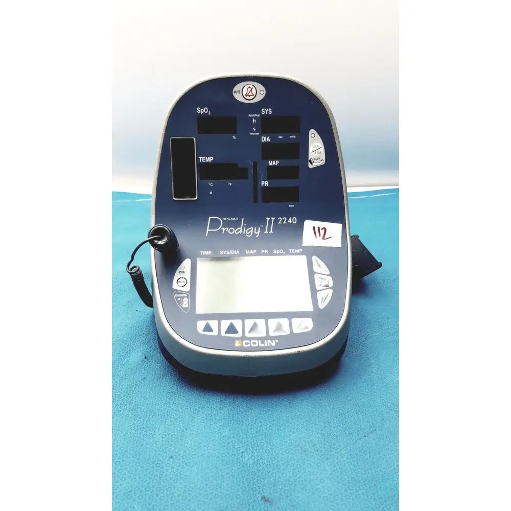 Blue and silver colin press-mate prodigy ii 2240 patient monitor with digital display and multiple sensor input ports