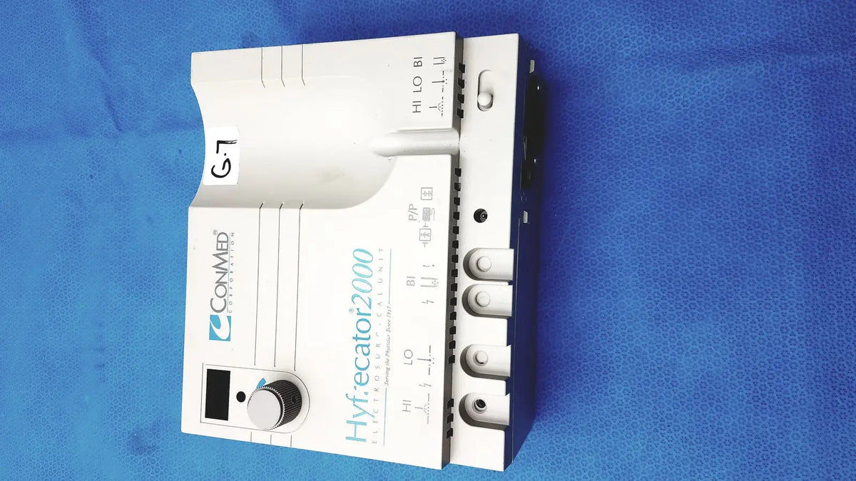 White conmed hyfrecator 2000 high frequency equipment with black digital display and silver rotary knob for surgical use