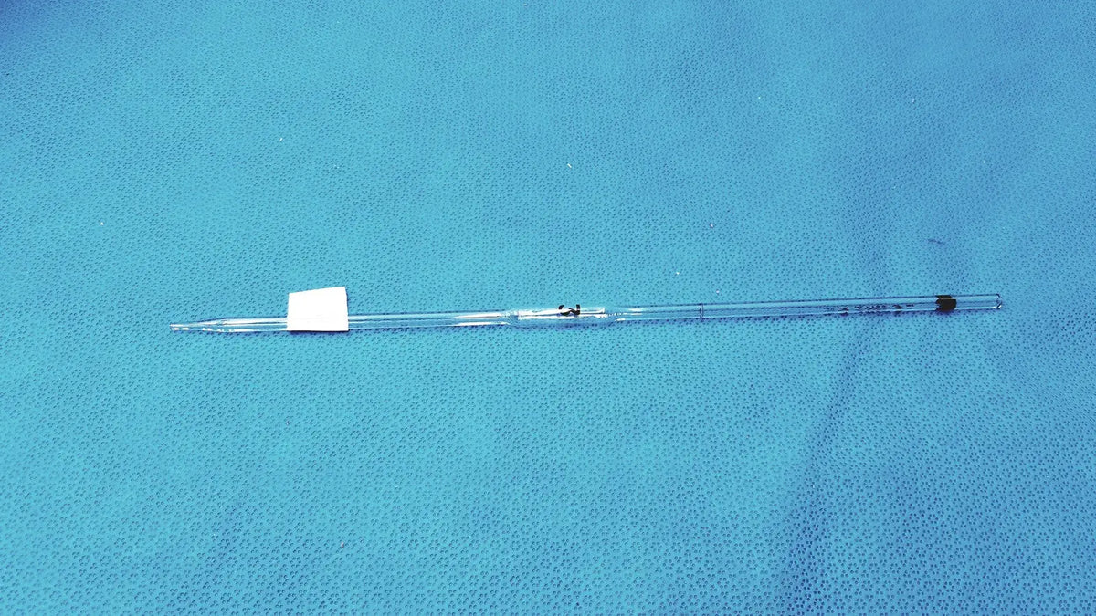 Clear glass corning pyrex 3ml reusable pipette with white label and black calibration markings for precise measurement