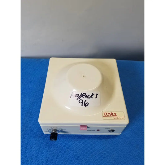 Cream-colored costar model 10 mini centrifuge with fixed position angled rotor and control dial for laboratory use