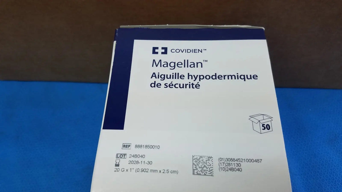 Covidien Magellan hypodermic safety needle package in white and blue with black text for safe injection use