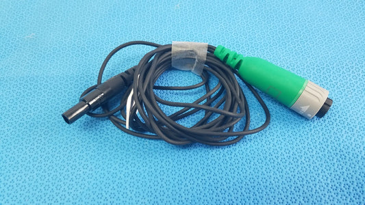 Black coiled catheter connector cable with green gray connector and black plug for reuse medical equipment in EnSite X EP system