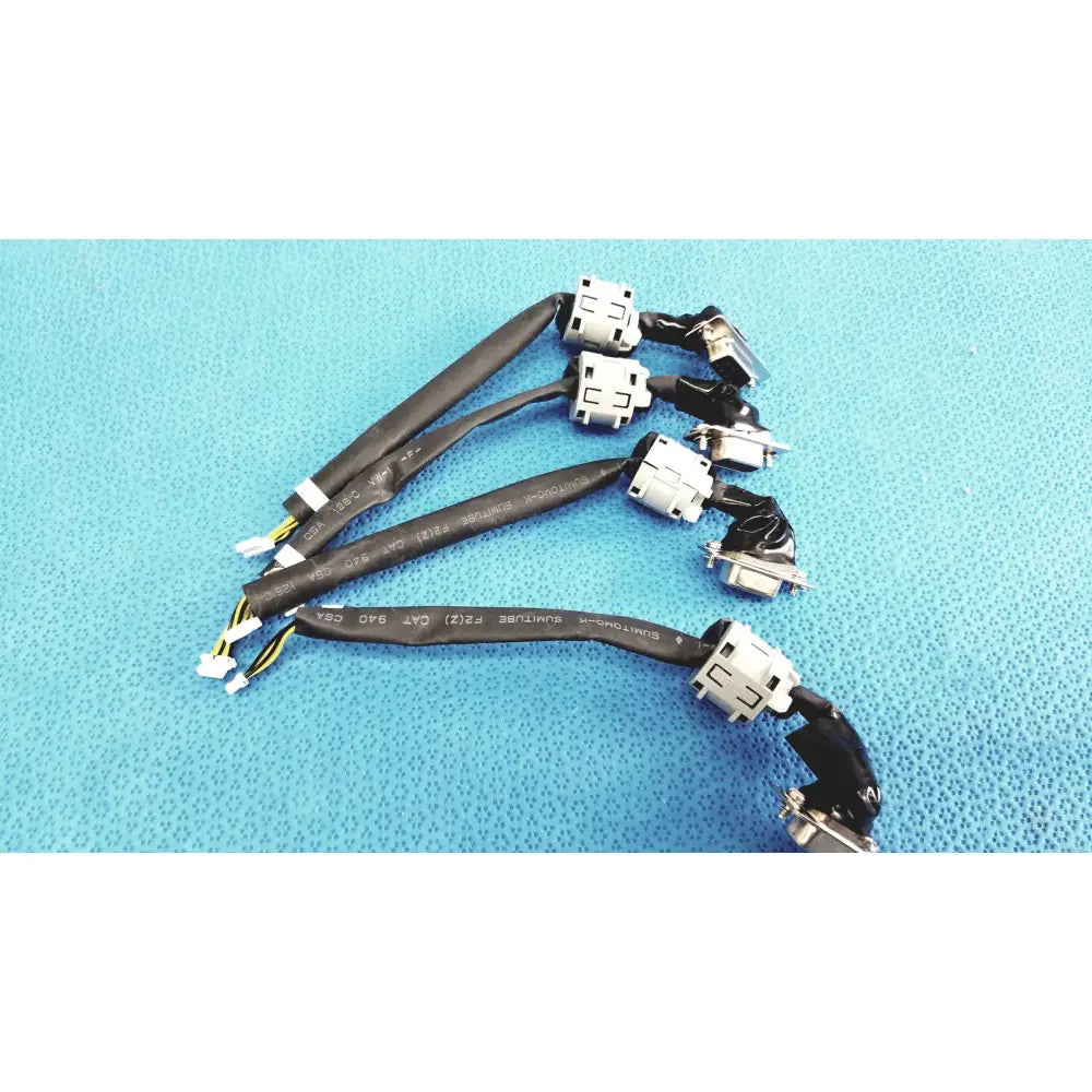 Black insulated d-sub 9-pin serial to 4-pin wire harness cable with white connectors and printed specifications for industrial use