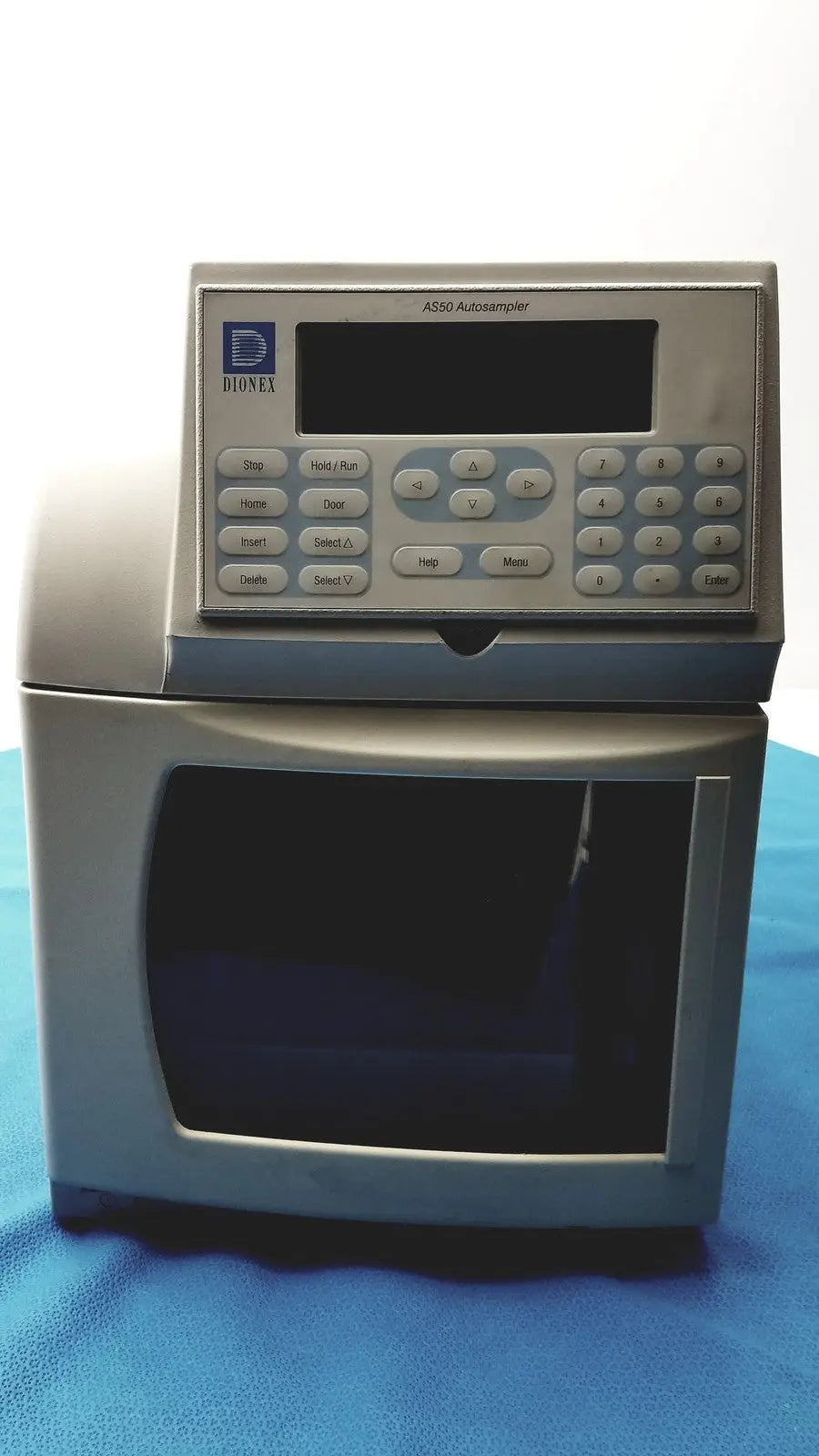 Gray metallic dionex as50 autosampler laboratory instrument with digital display and control panel for chromatography systems