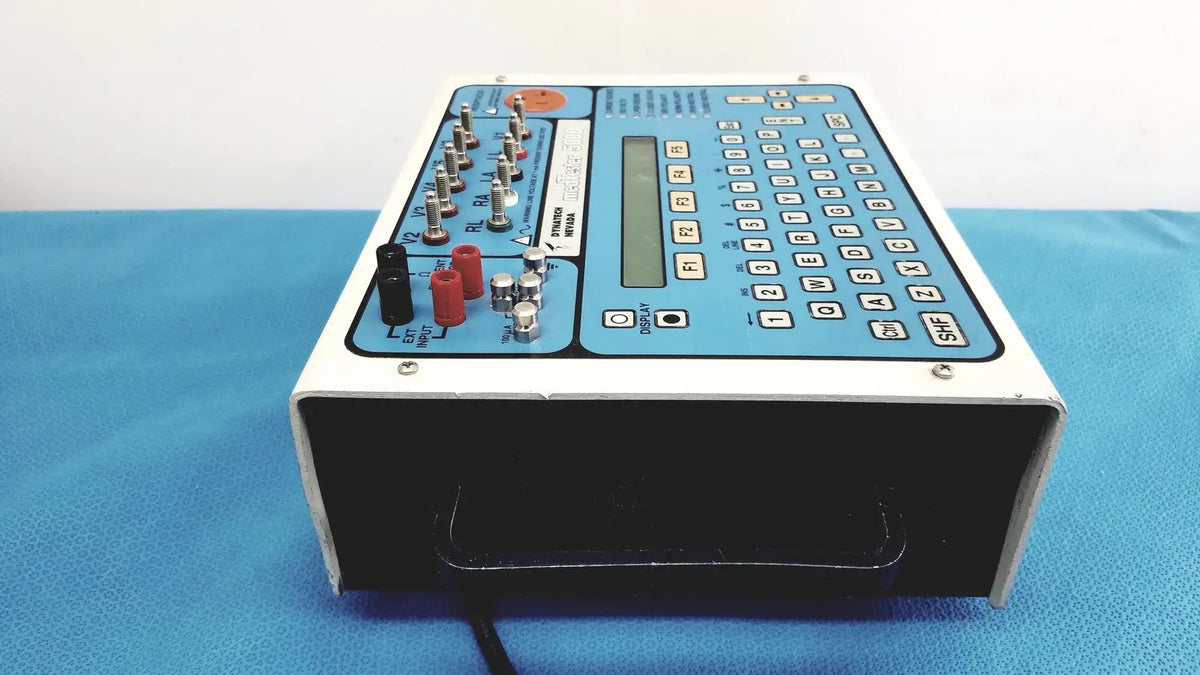 Blue and white dynatech nevada medtester 5000 biomedical electrical safety analyzer with keypad display and input jacks