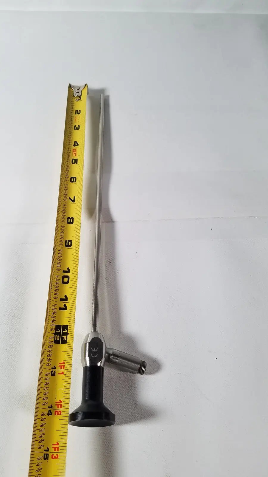 Dyonics 7207951 silver degree autoclavable laparoscope with black handle and yellow tape for reuse medical use