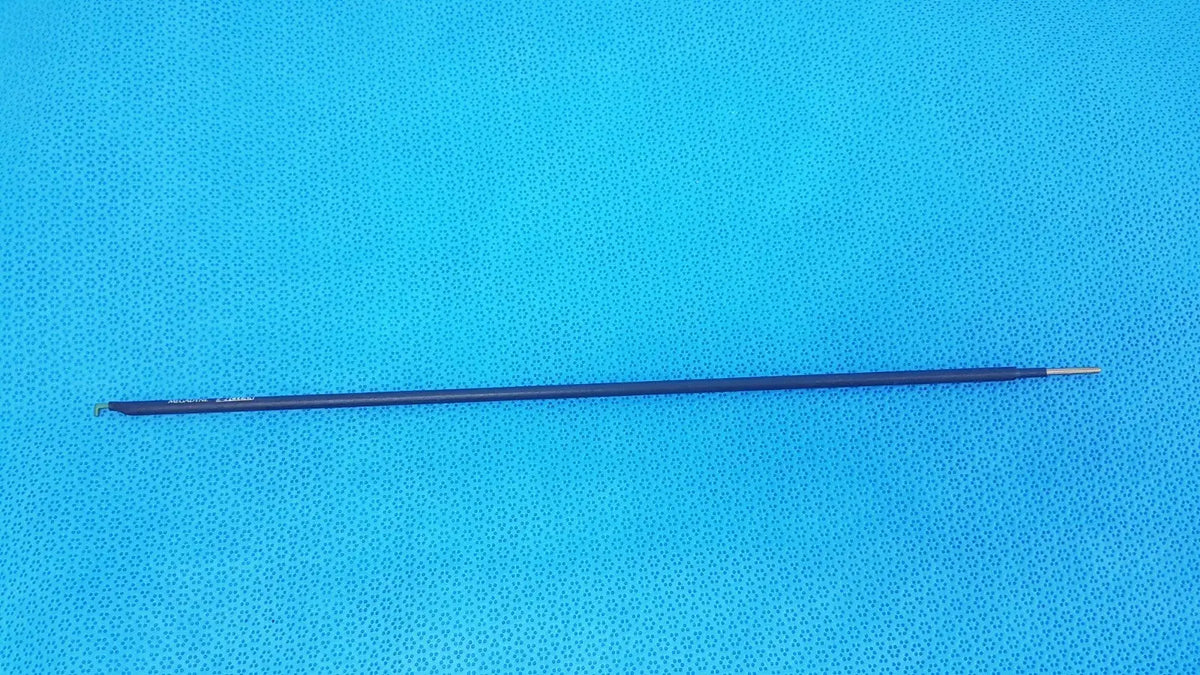 A sleek dark blue e-z clean hook lap dissecting electrode with a metallic tip and metal loop for precise lap dissecting use